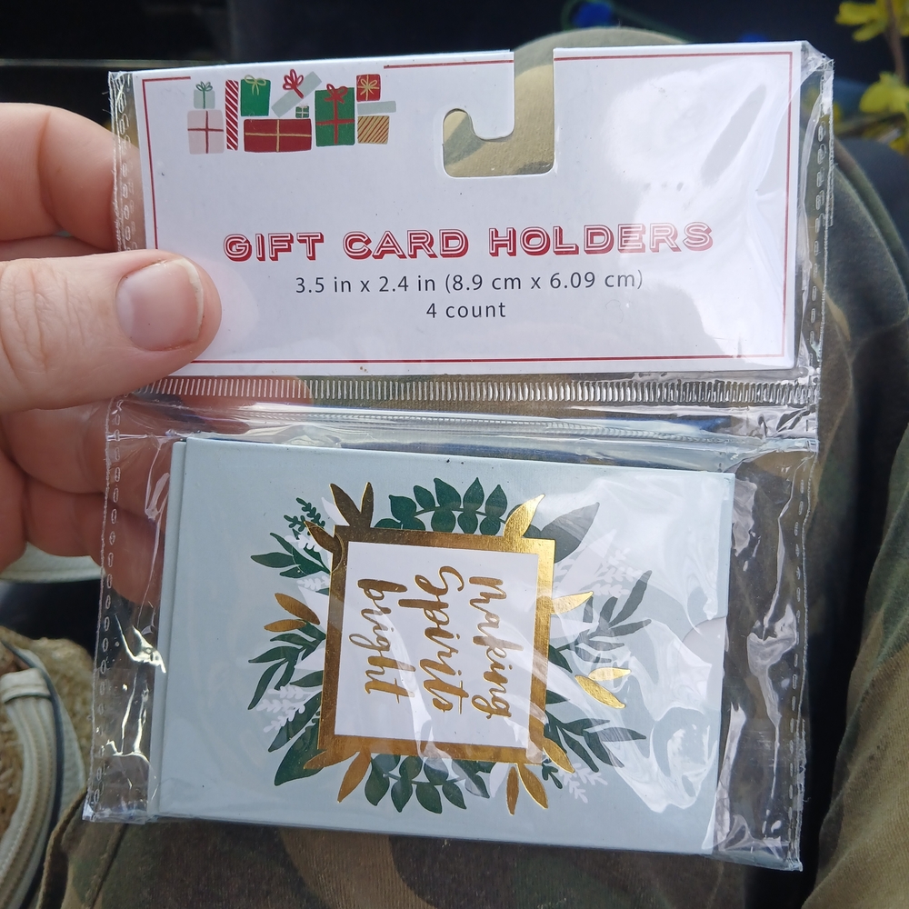 set of 4 holiday-themed gift card holders designed with a "Making Spirits Bright